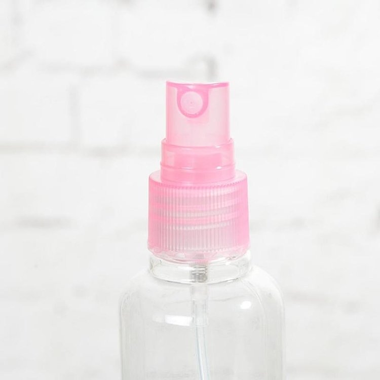 Transparente Reiseflasche mit Spray, 100 ml