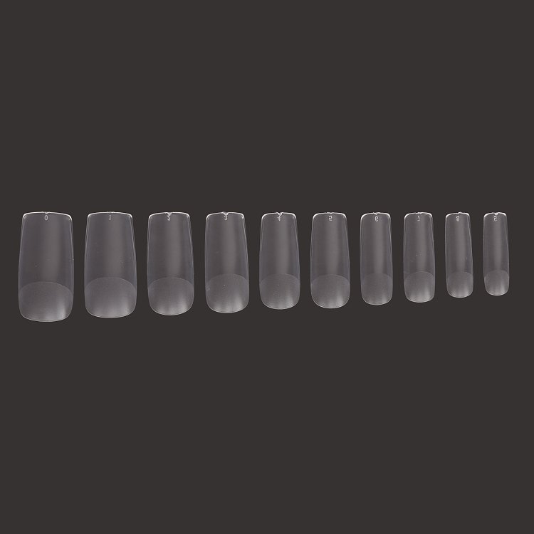 Christian Artesio transparent soft gel tips Squoval Medium for natural nail extension.