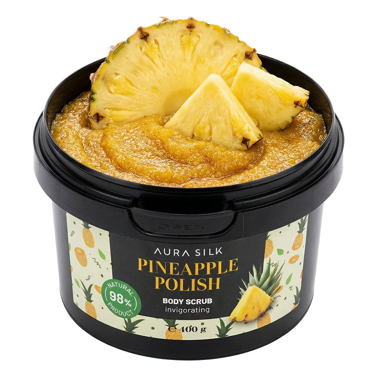 Scrub Σώματος Aura Silk Pineapple Polish 400g, αναζωογονητικό σε μαύρο βαζάκι, ανοιχτό με κίτρινη υφή scrub και κομμάτια ανανά στην επιφάνεια