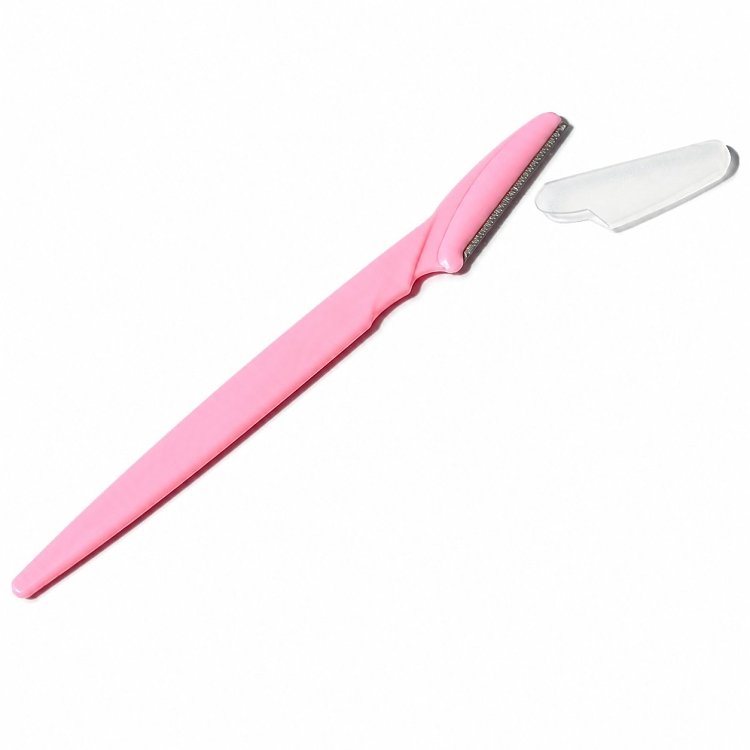 Pink eyebrow razor with protective blade cap